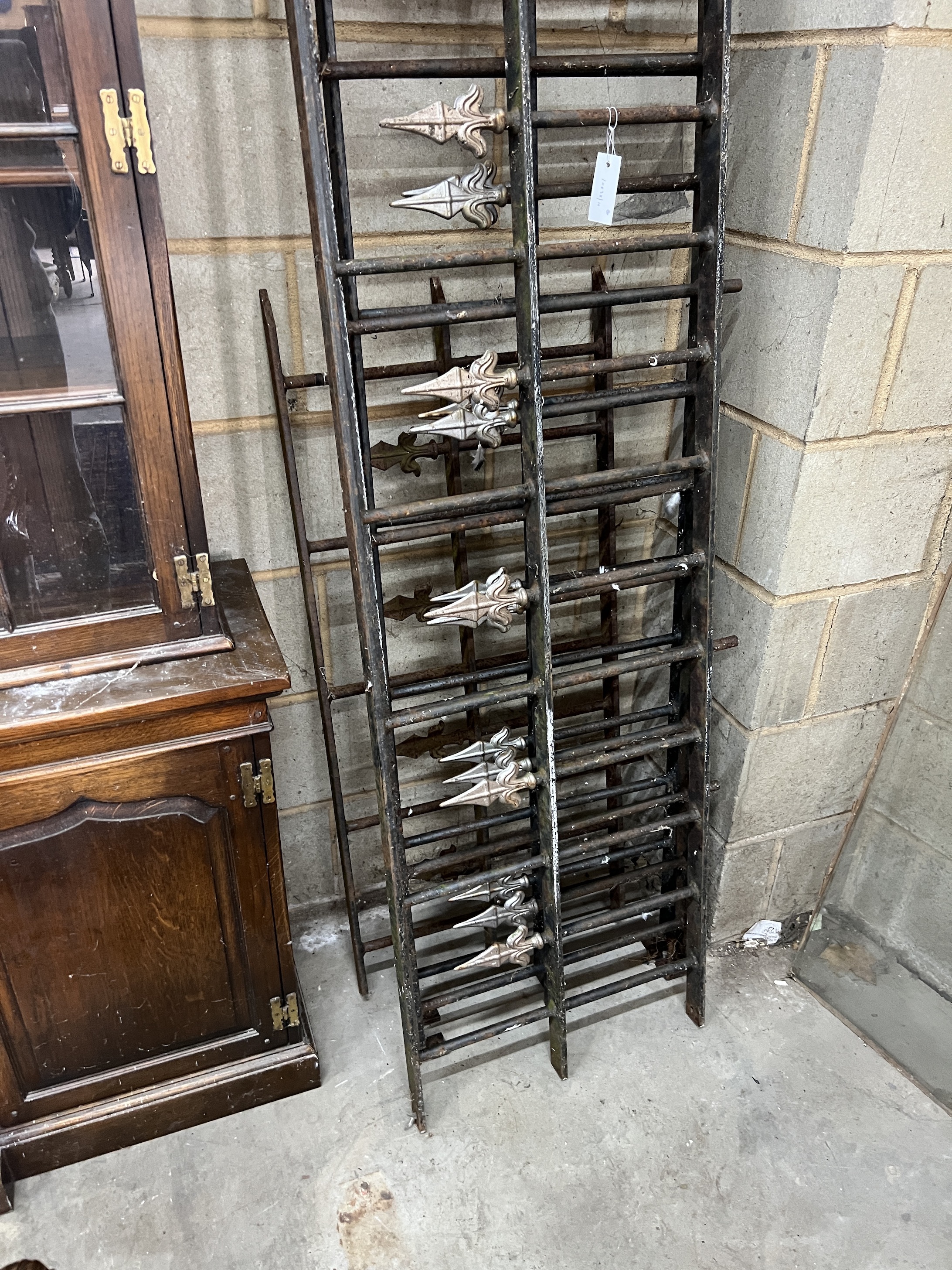 Four sections of Victorian style cast iron railings, combined length approx. 810cm, height 49cm